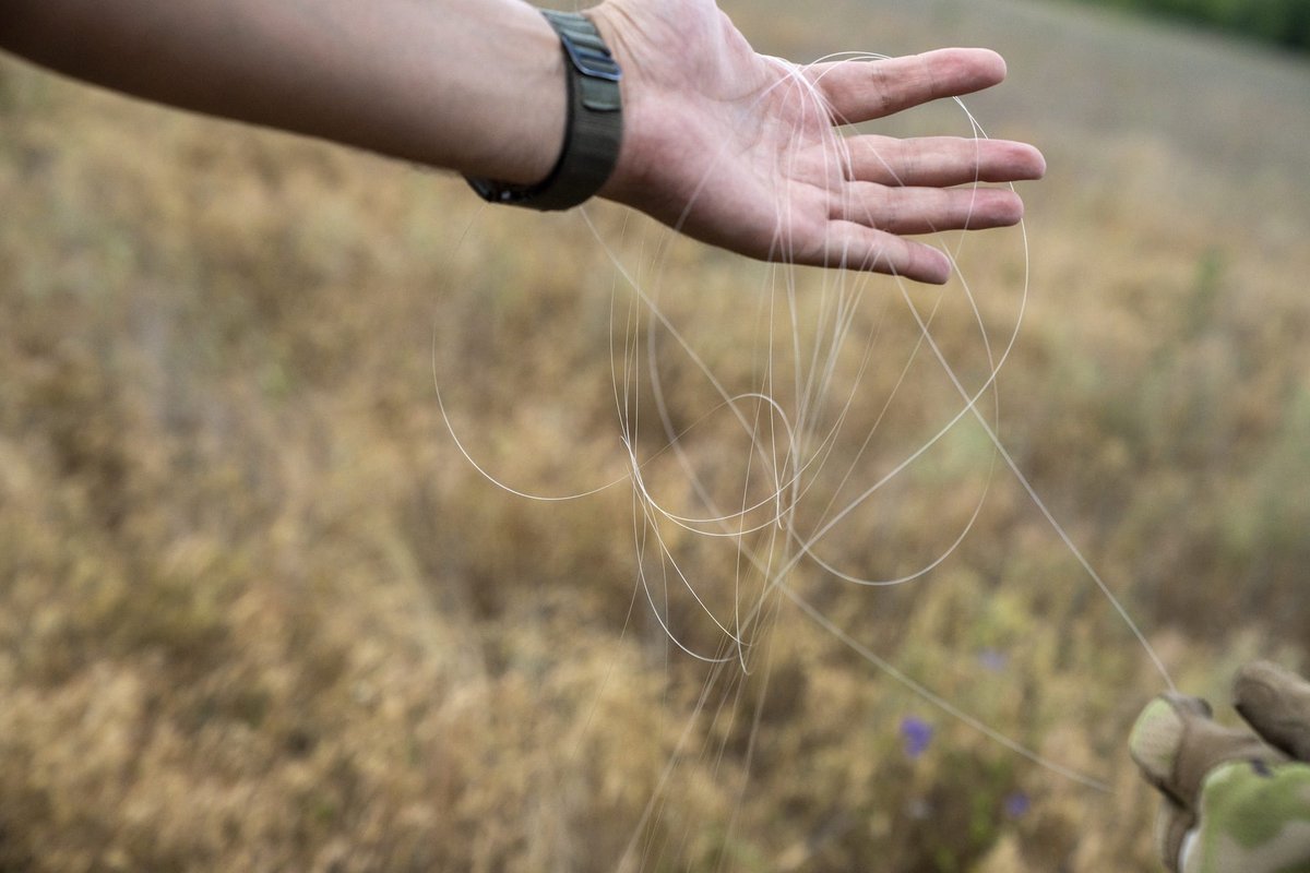 Ukrainian soldiers armed with scissors say they cut any fiber-optic drone cable they see — even if it might be their own