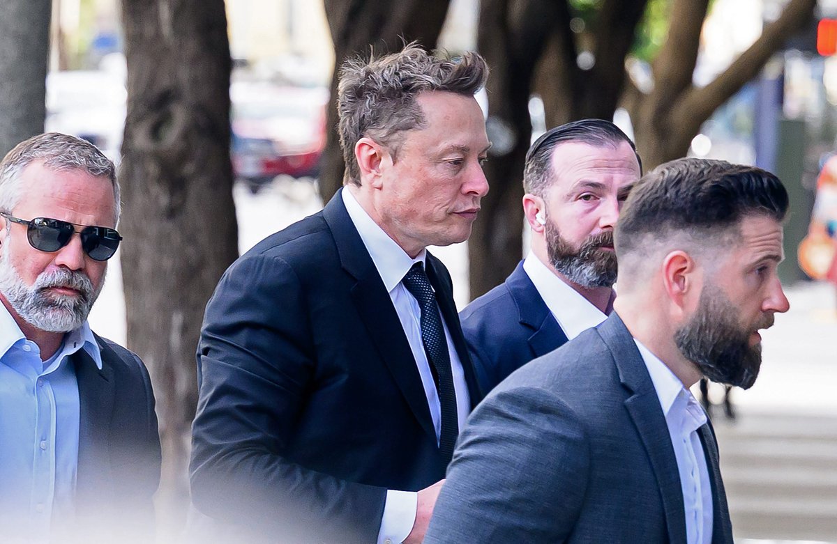Elon Musk dodged cameras ahead of courthouse testimony. Snubbed photogs blamed a 'decoy' Tesla.
