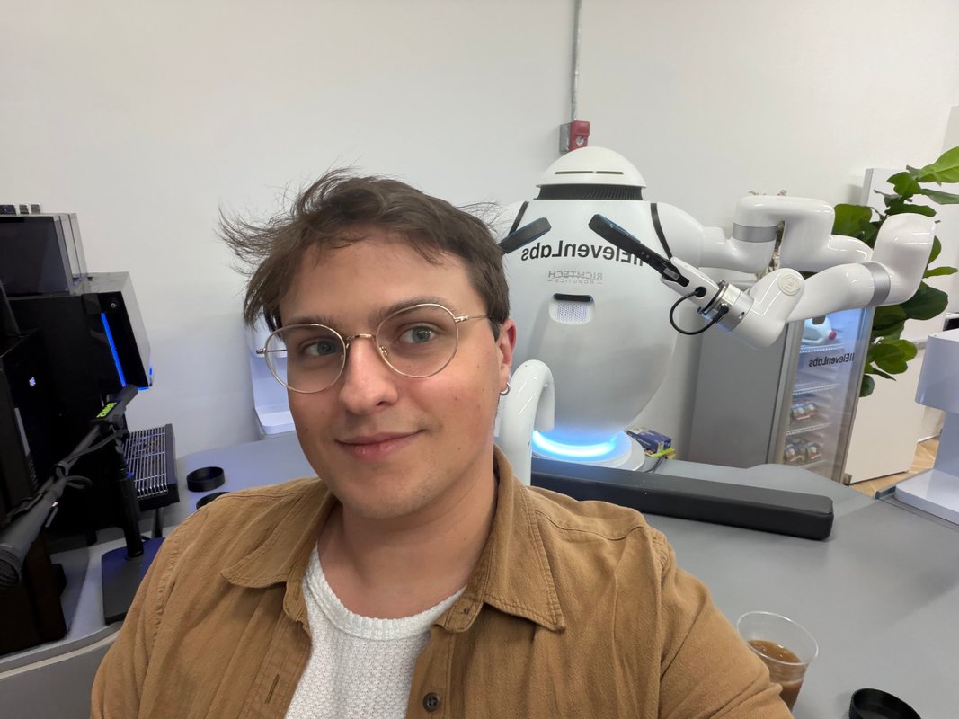 I went to ElevenLabs' NYC pop-up. A robot poured me cold brew before I haggled with an AI shopkeeper.