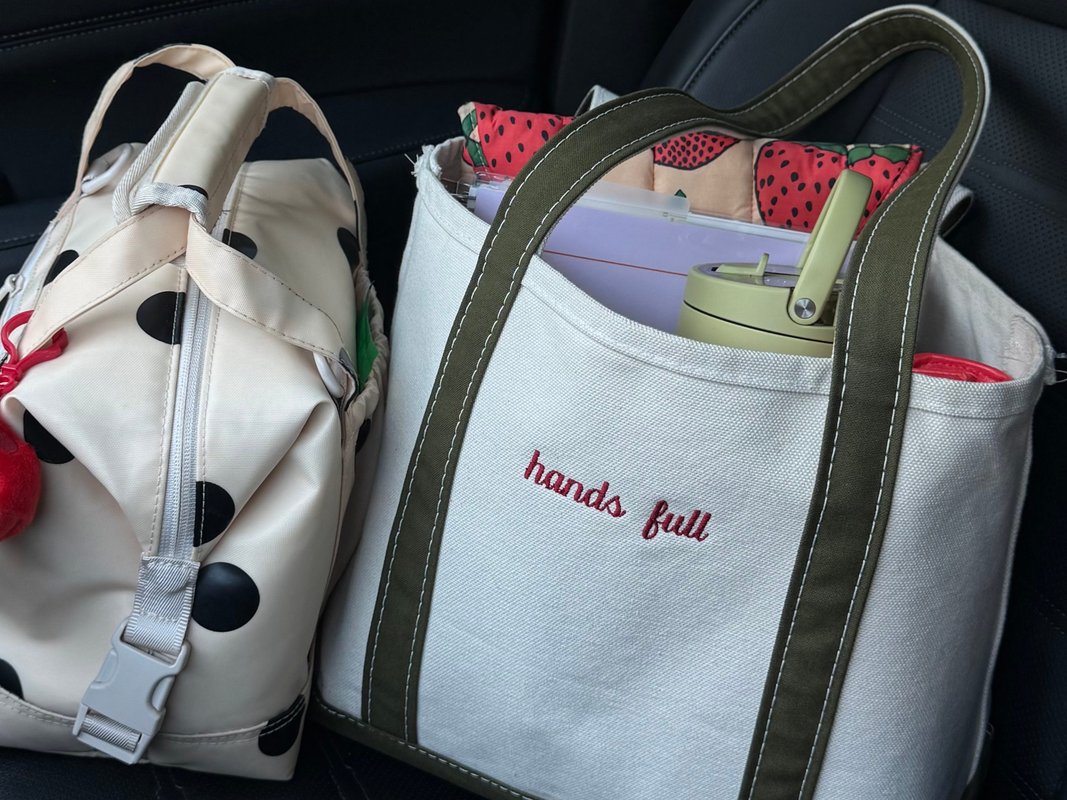 Women in the workplace are putting a: new twist on L.L.Bean's famous tote bags