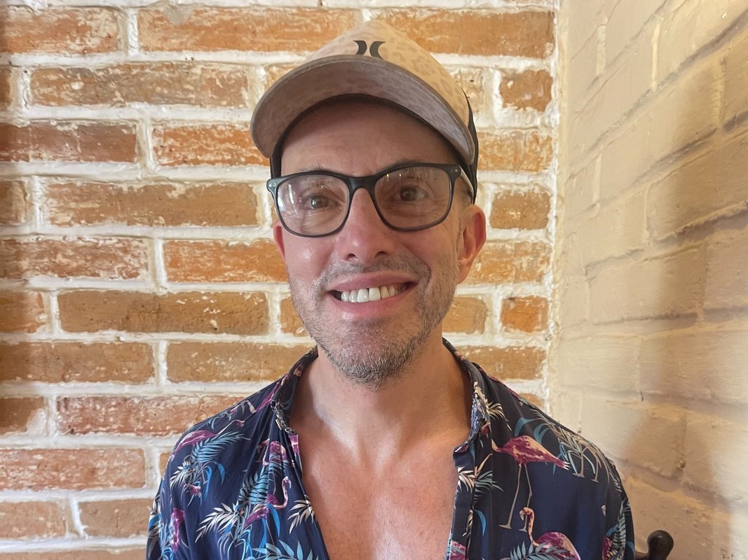 I live between New York and Puerto Vallarta. There are burned-out cars in my neighborhood — but I won't leave.