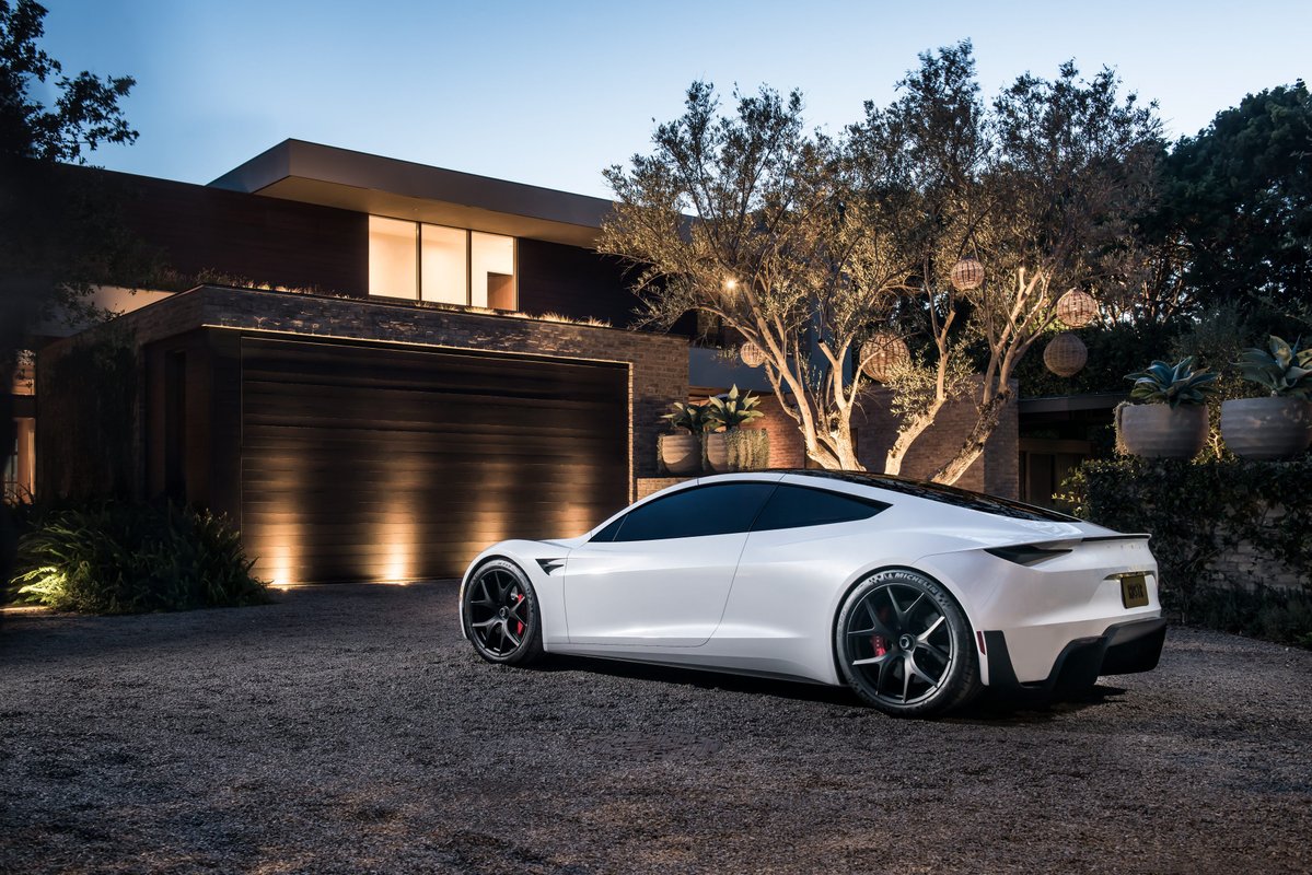 Tesla's design chief says Roadster's reveal is coming 'very soon'