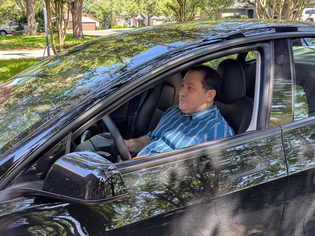 This tech exec sued Tesla over its Full Self-Driving promises — and won