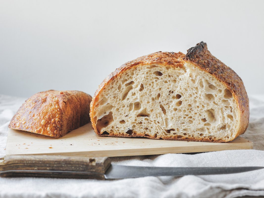I make my own sourdough bread to save money on: groceries. Here are 5 things I wish I'd known before starting.