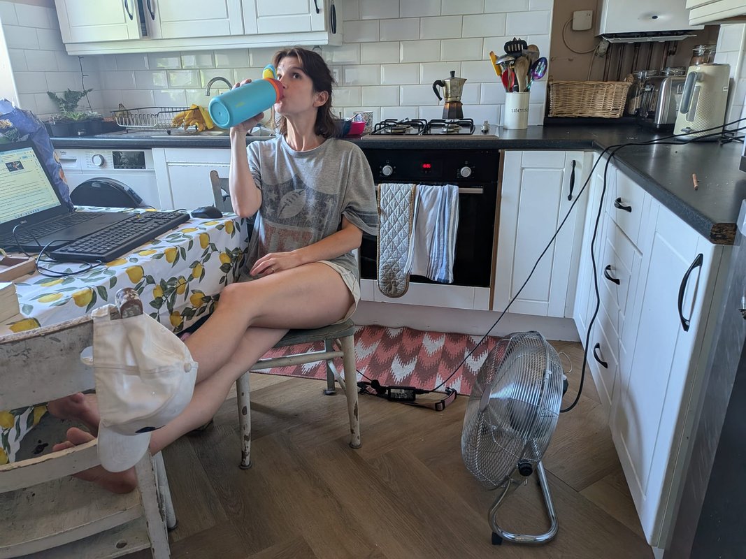 I'm an American living through the UK heat wave. My: kids' school is canceled, and every room feels like a sauna.