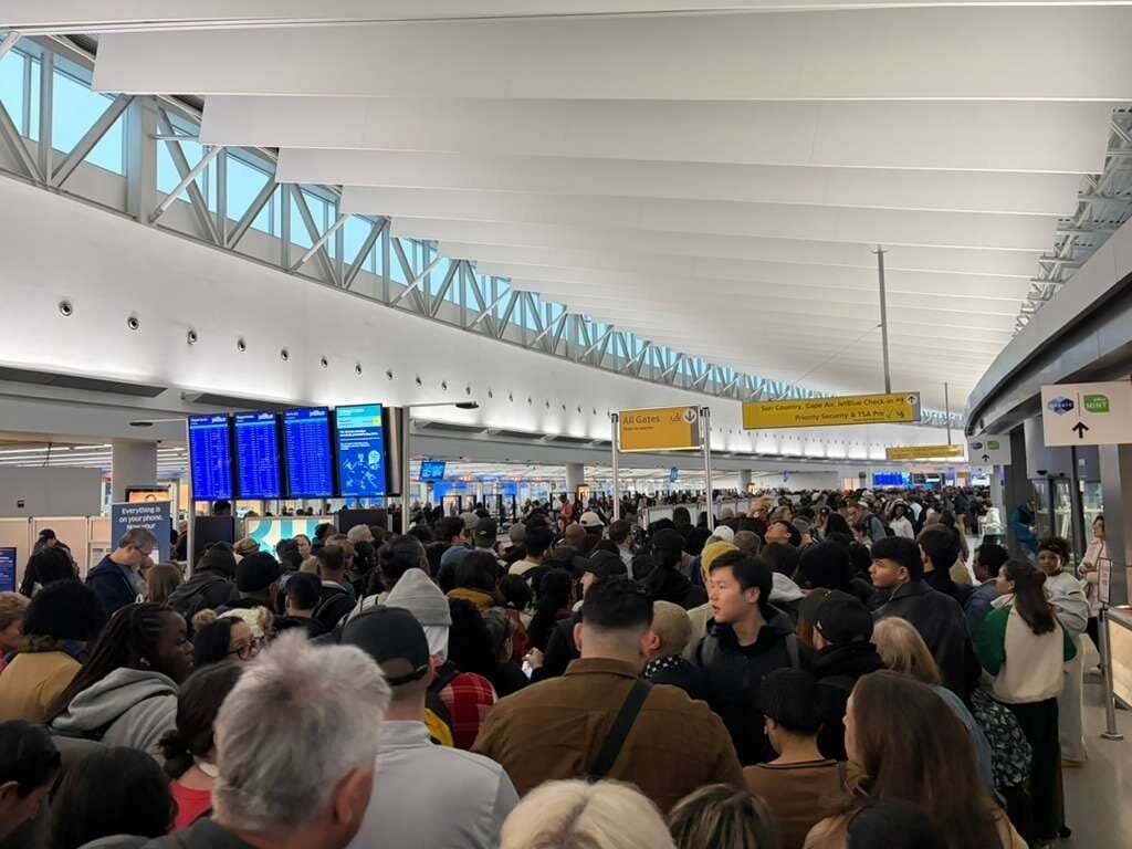 Travelers describe airport chaos as unpaid TSA agents stop showing up: 'The line is coming from all directions'