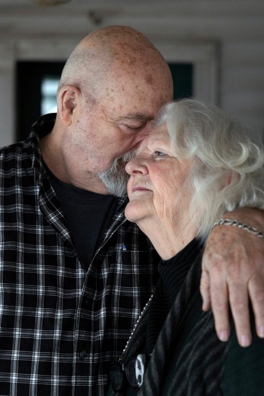 20 years ago, they were caring for: loved ones. They're still struggling to financially recover.