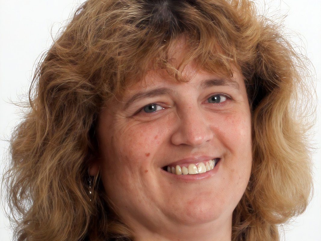 I was laid off at 56 and took a 60% pay cut to land my next role — the biggest thing I feel is anger