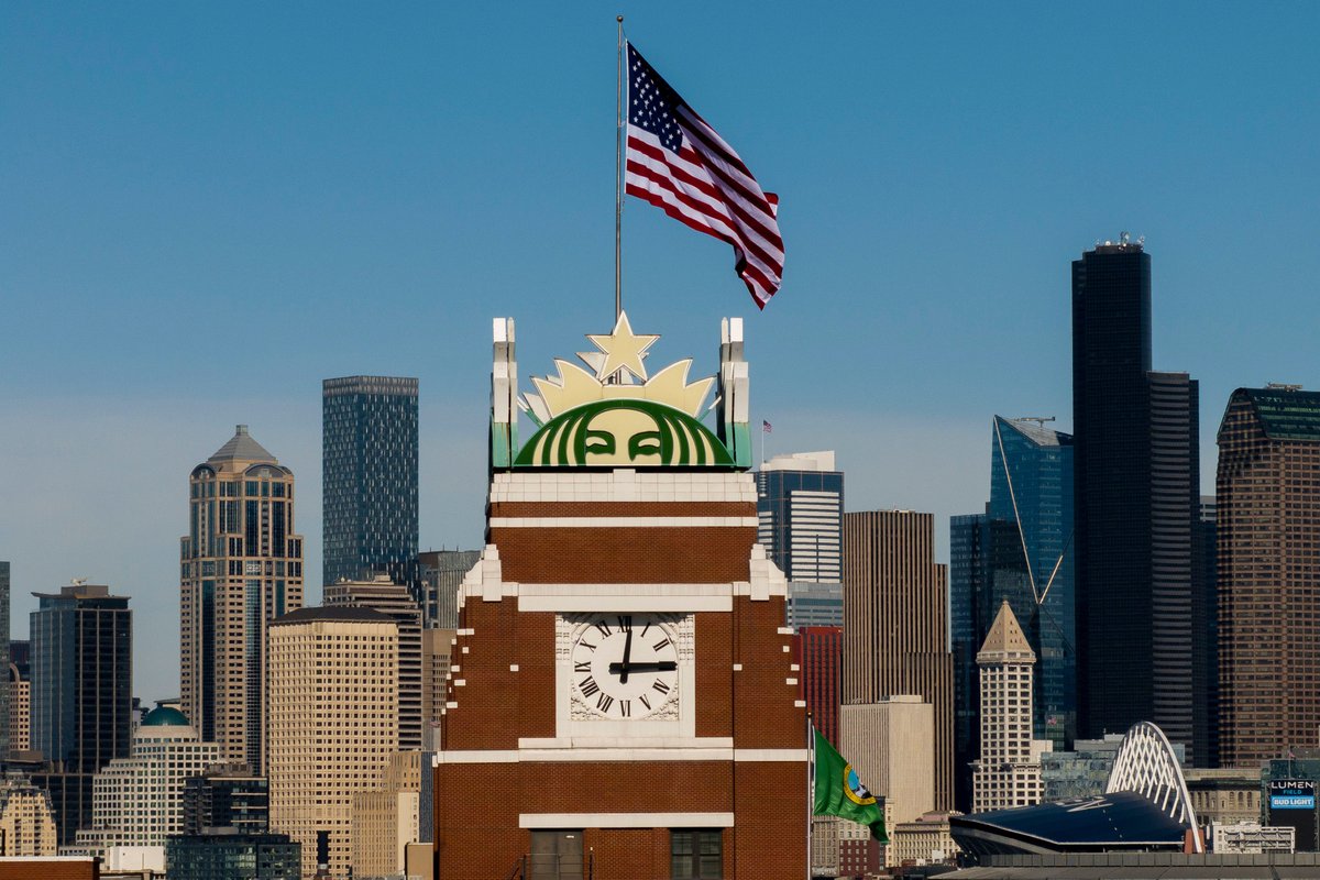 Starbucks says its turnaround is gaining momentum and cuts 300 more jobs