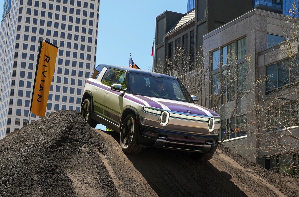RJ Scaringe said there are 2 big reasons Rivian's new R2 doesn't look like a Tesla Model Y dupe