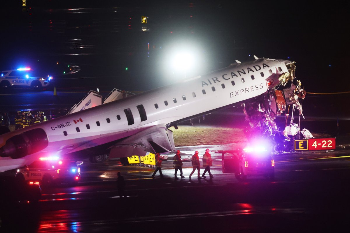 NTSB head says she had to 'beg' to get an Air Canada crash investigator through an hourslong TSA line in Houston