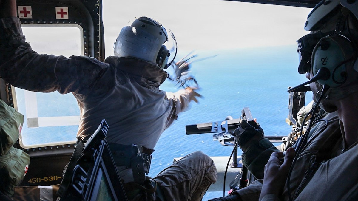 US Marines launched a drone from a moving helicopter to scout a ship for a special operations boarding team