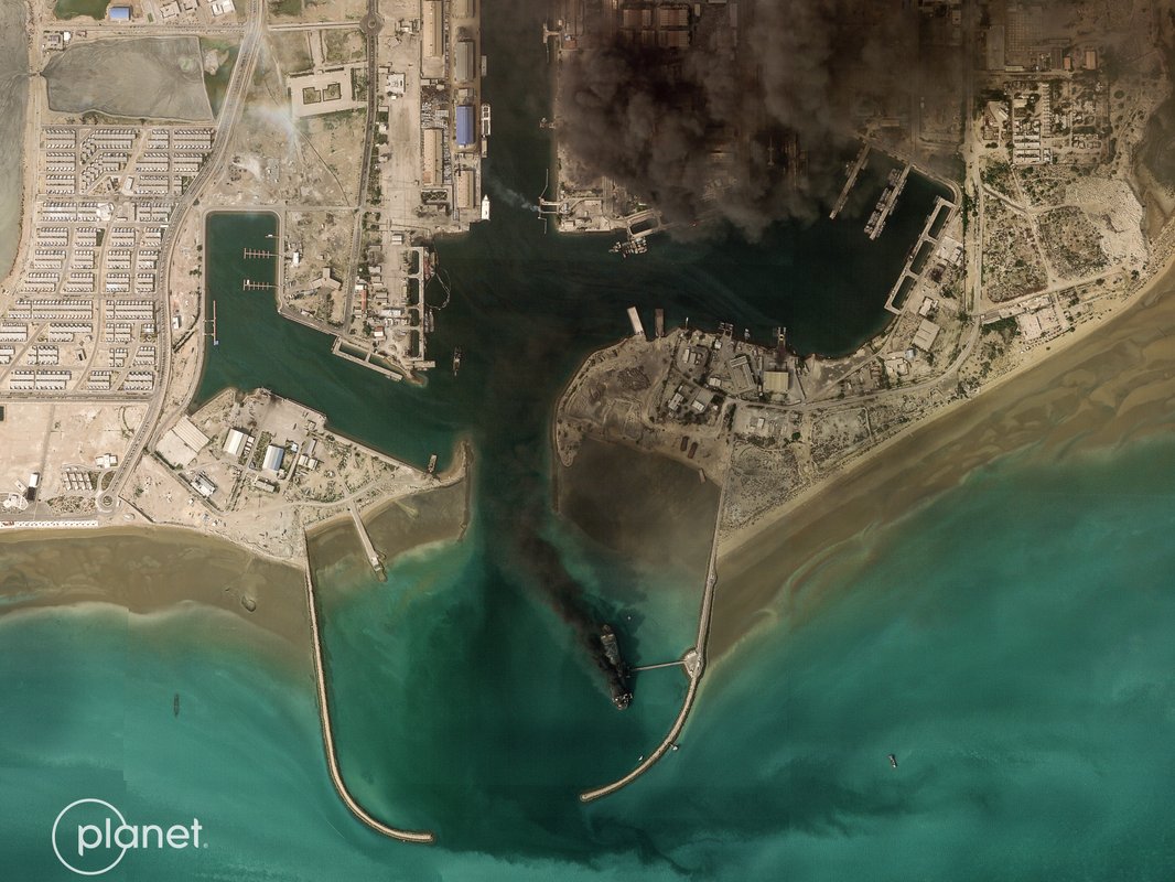 Satellite image shows Iran's largest naval vessel, a tanker-turned-warship, smoking in port