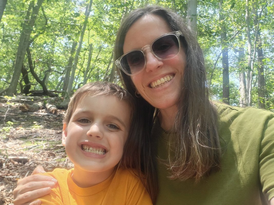 I bought a duplex with my ex so we could: co-parent our son. He has 2 rooms and I get privacy.
