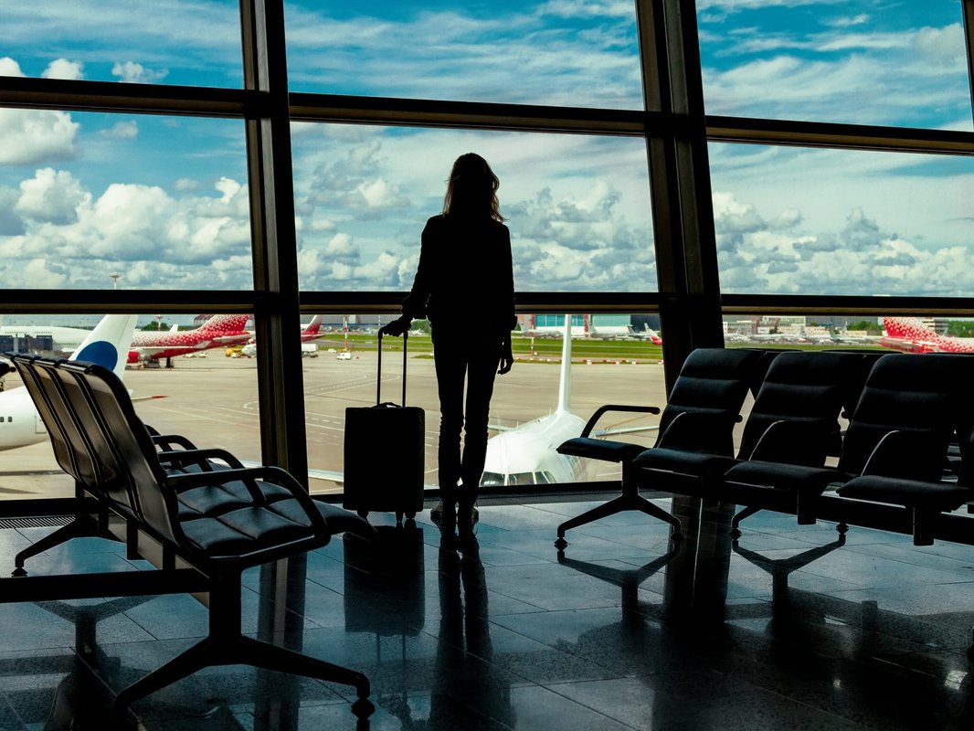 I've traveled to 17 countries and have learned that: a checked bag is always worth it. Here's why.