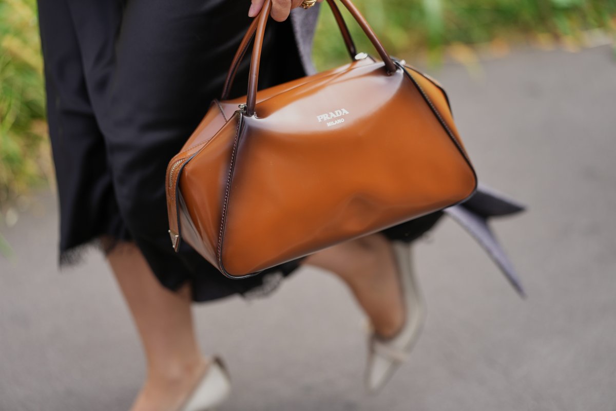 Wearing high-end items to work could be costing you raises and promotions